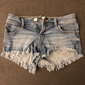 Medium-wash short jean shorts